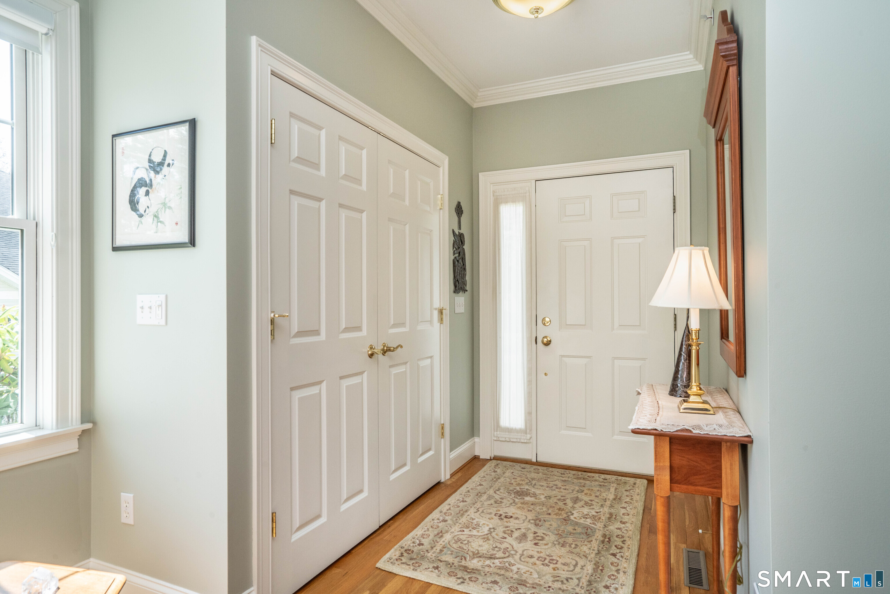 6 Bittersweet Lane, Unit 6 Avon, CT 06001 - Photo 4 of 39 a view of an entryway with wooden floor