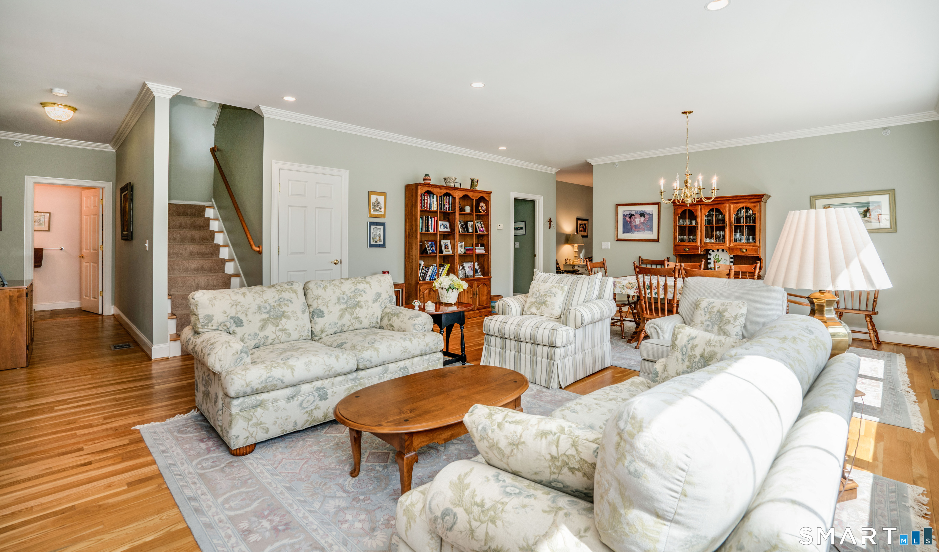 6 Bittersweet Lane, Unit 6 Avon, CT 06001 - Photo 5 of 39 a living room with furniture and a wooden floor