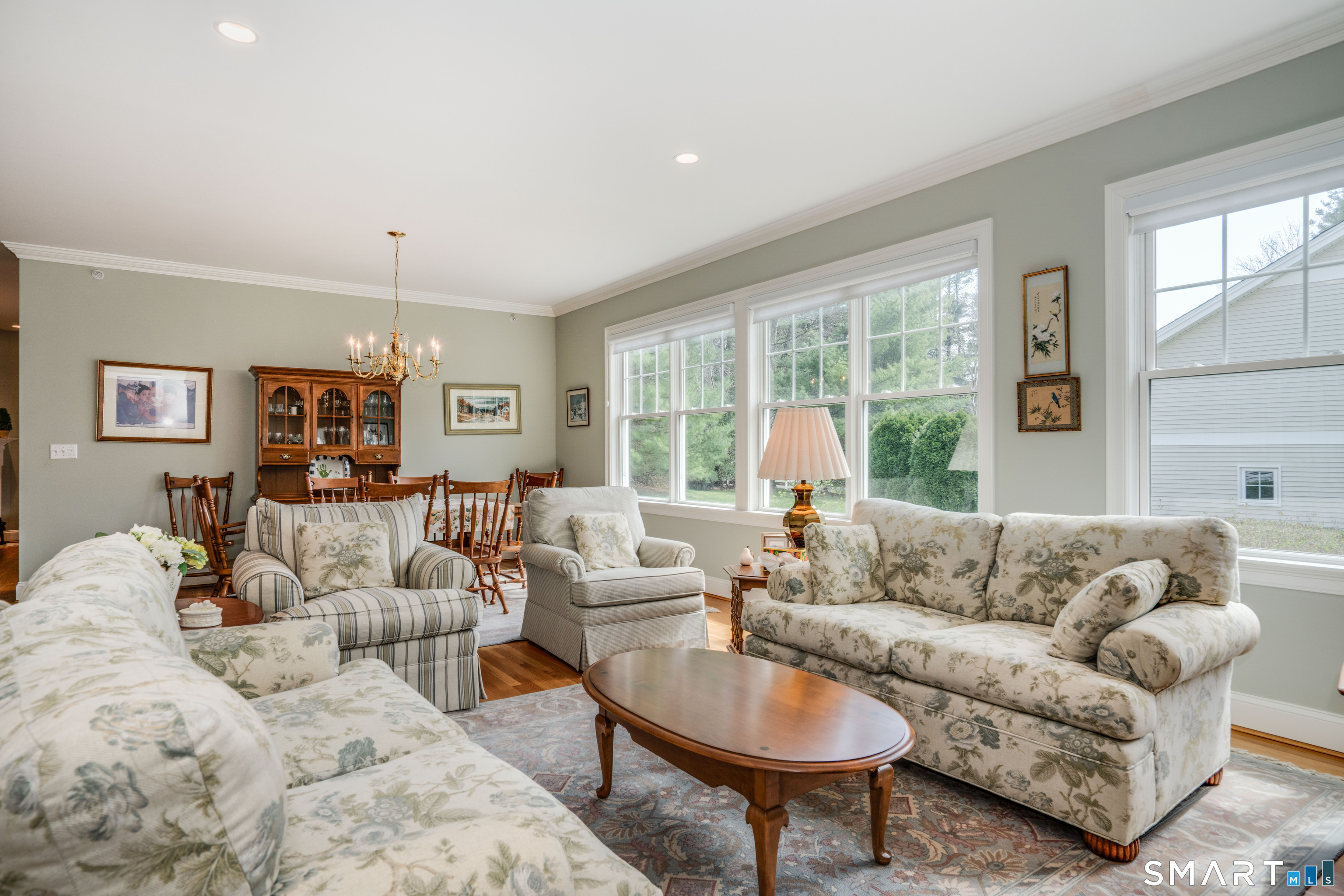 6 Bittersweet Lane, Unit 6 Avon, CT 06001 - Photo 7 of 39 a living room with furniture and a large window