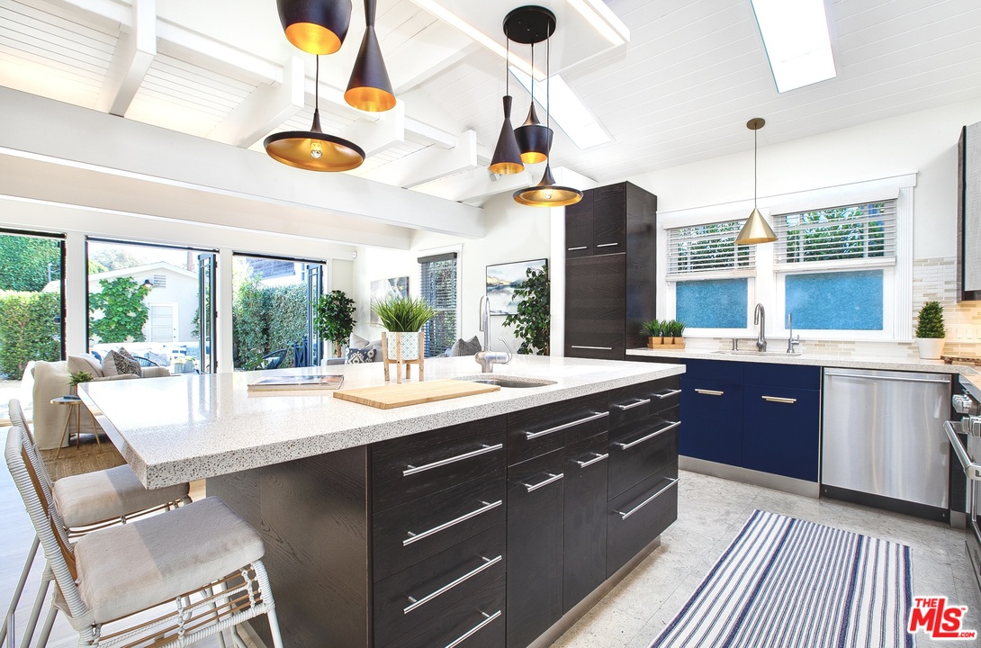 754 Palms Boulevard Venice, CA 90291 - Photo 12 of 45 a large kitchen with a large window and cabinets