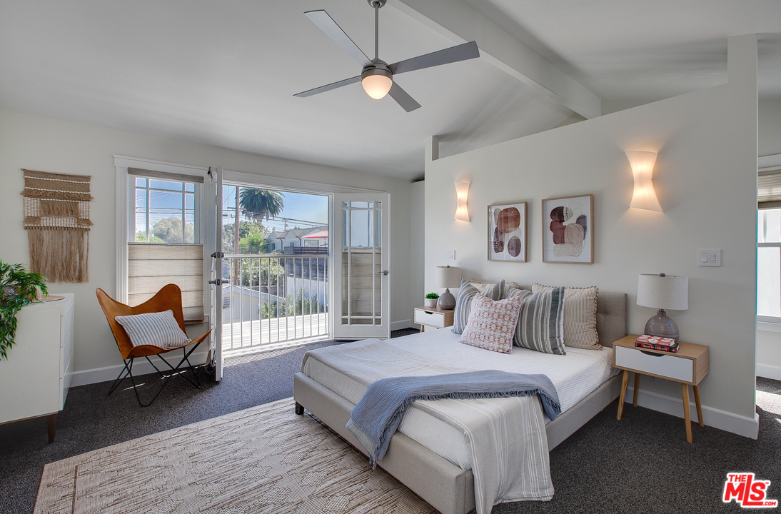 754 Palms Boulevard Venice, CA 90291 - Photo 37 of 45 a bedroom with a bed chair and window