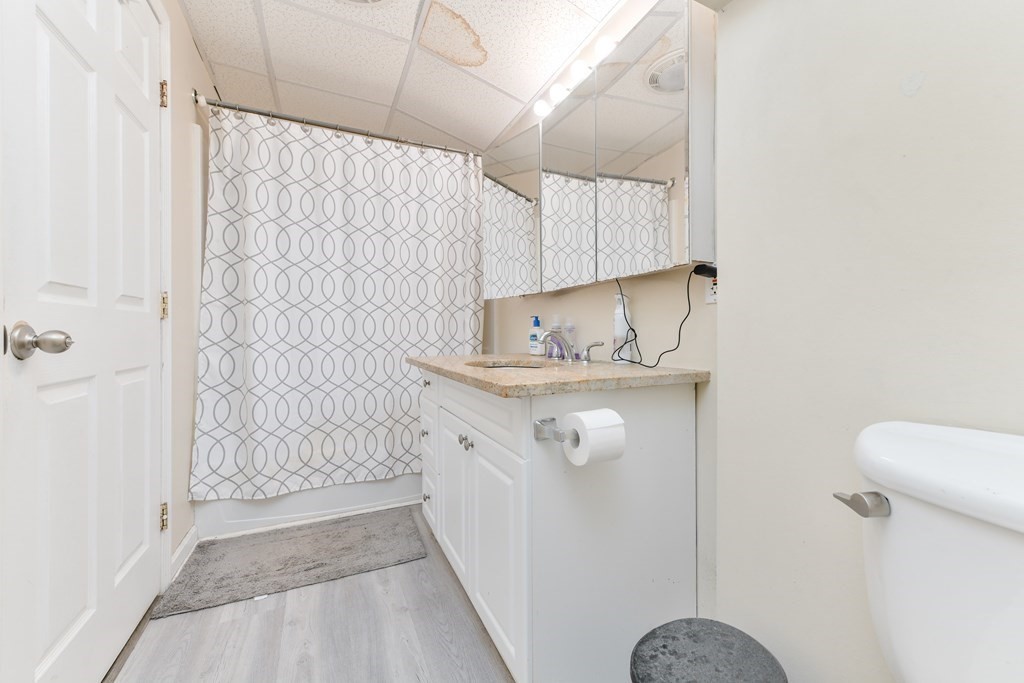 748 East 3rd Street, Unit A Boston, MA 02127 - Photo 10 of 16 a bathroom with a shower and a sink