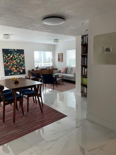 280 Southwest 20th Road, Unit 903 Miami, FL 33129 - Photo 14 of 26 a living room with furniture and a window