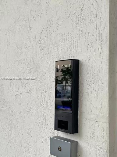 280 Southwest 20th Road, Unit 903 Miami, FL 33129 - Photo 22 of 26 a bathroom with a shower and a sink