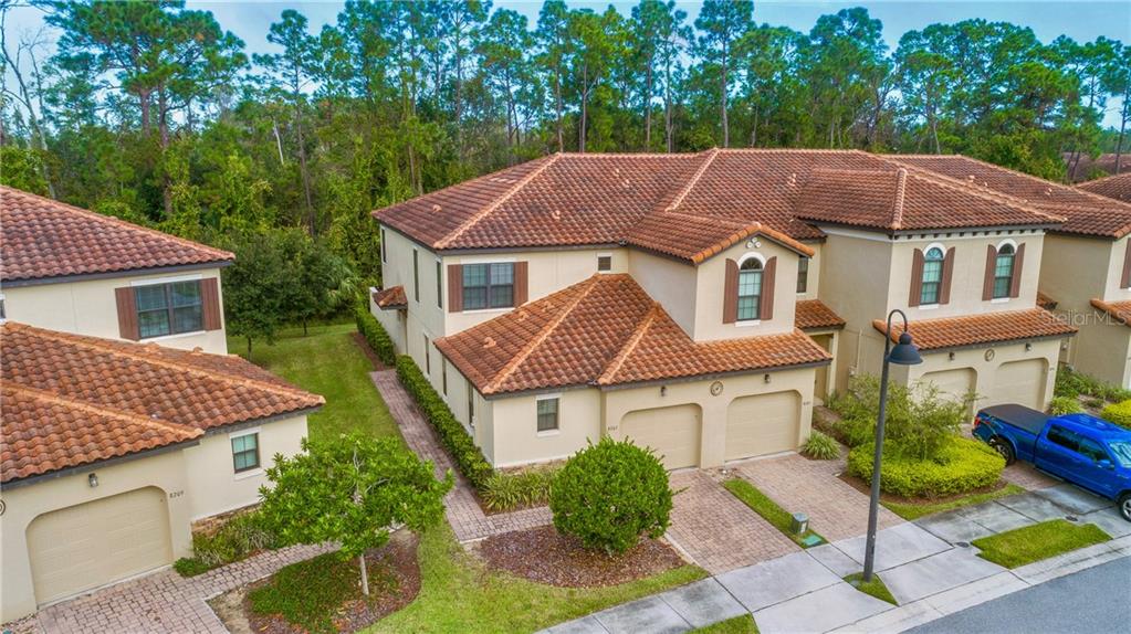 8207 Roseville Road Davenport, FL 33896 - Photo 1 of 1 a aerial view of a house with a yard
