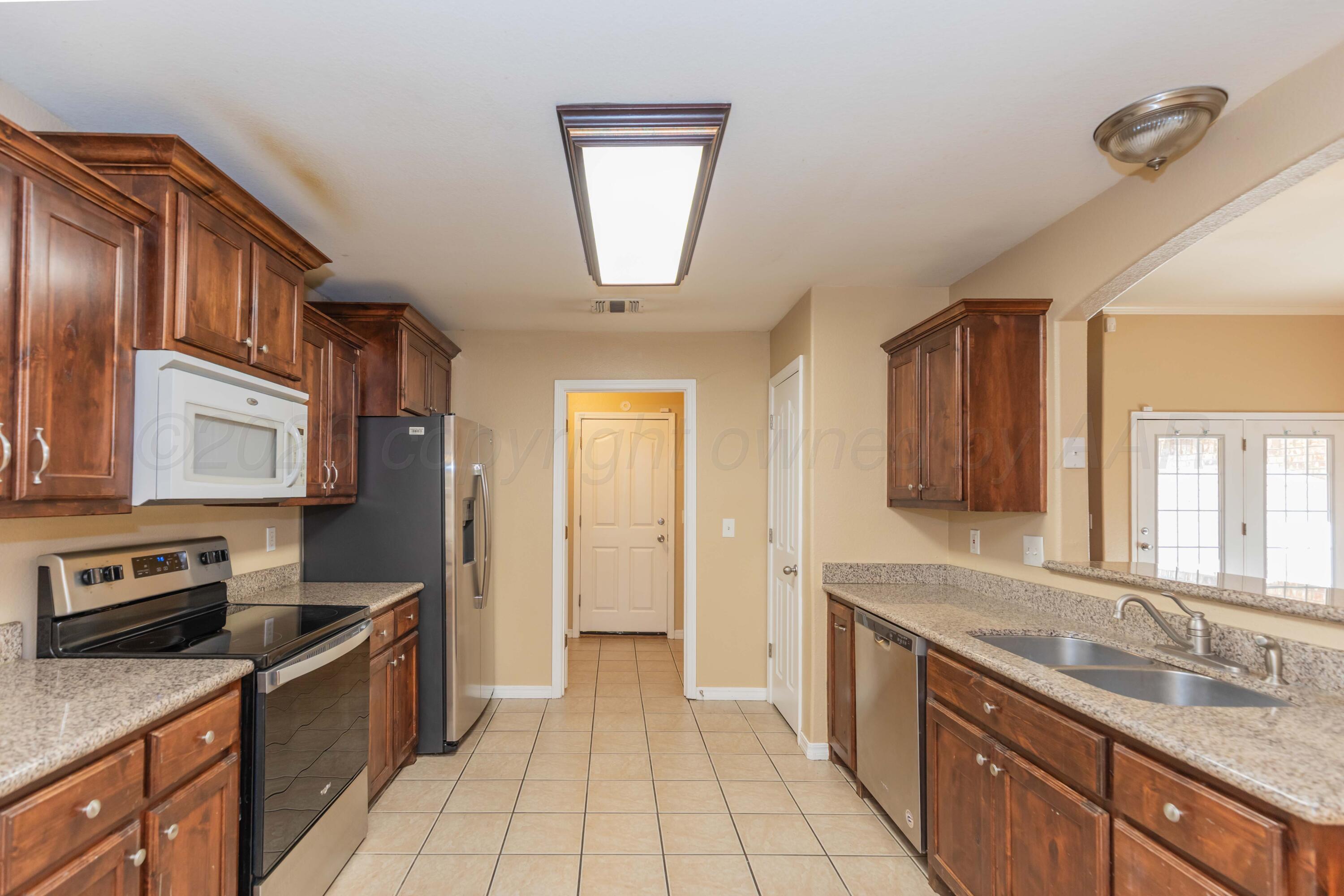 4207 Ross Street Amarillo, TX 79118 - Photo 9 of 40 KITCHEN VIEW 1