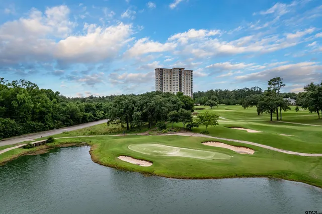 a view of a playground with basketball court