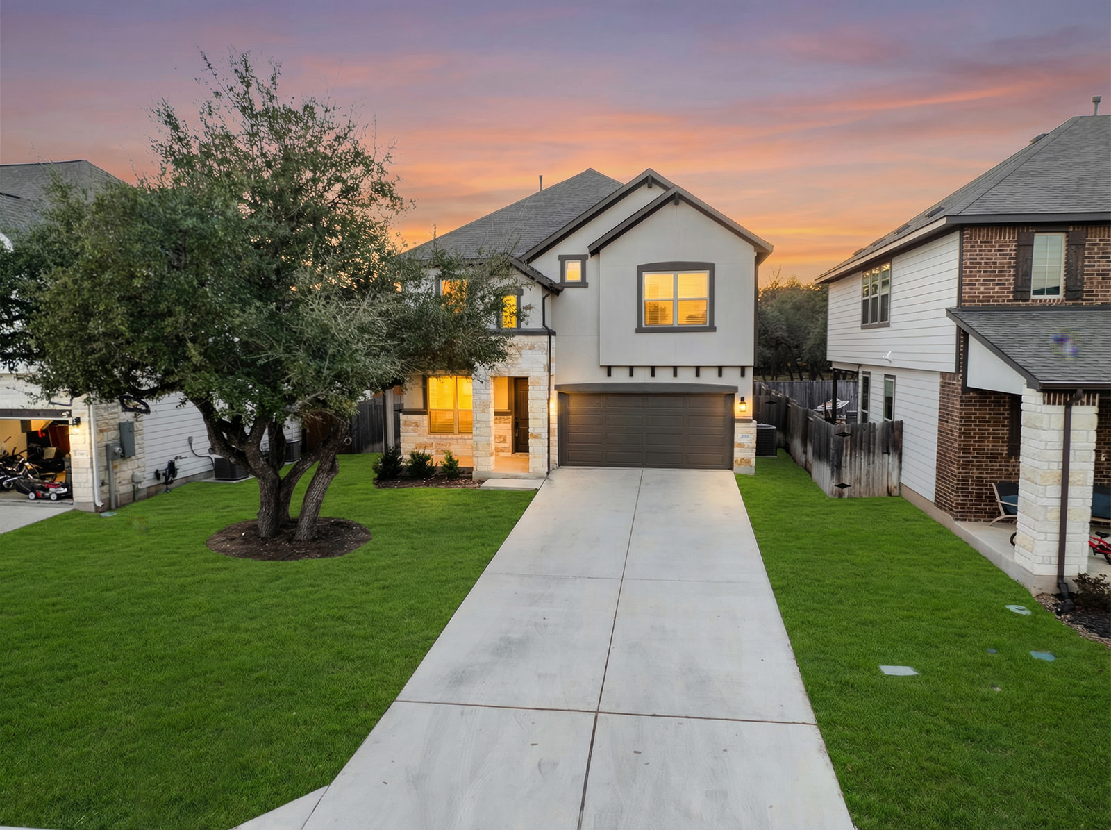 a front view of a house with a yard