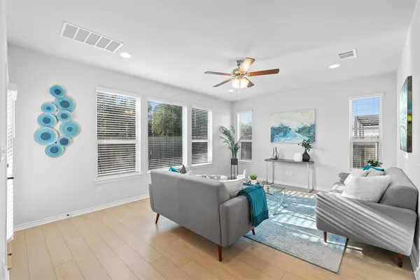 a living room with furniture and window