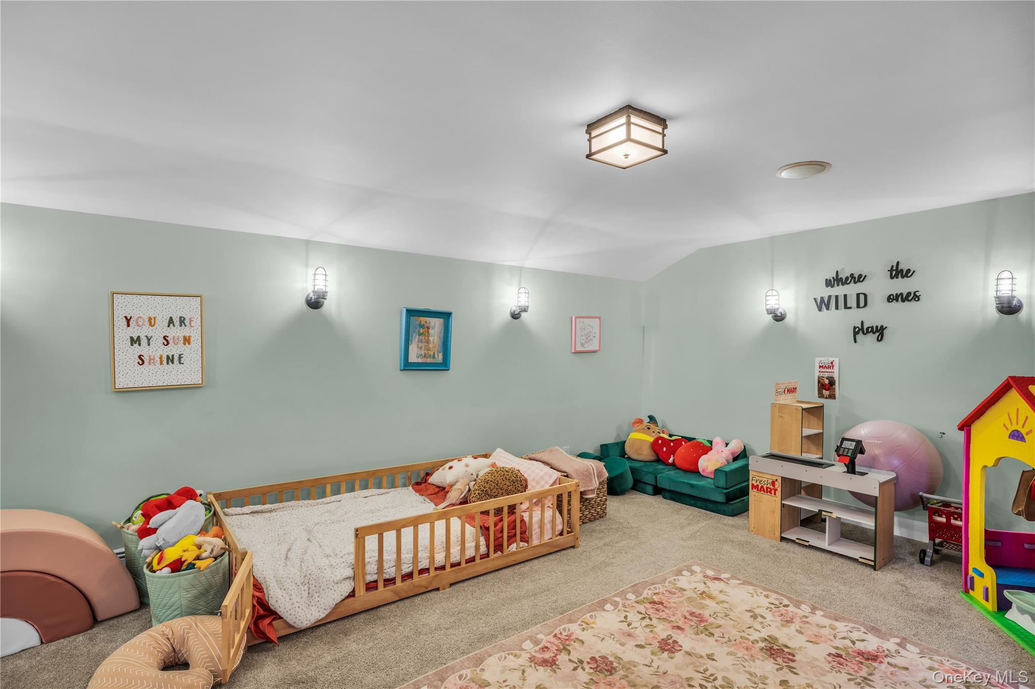 64 Sally Lane Ridge, NY 11961 - Photo 16 of 18 Bedroom with carpet flooring and vaulted ceiling