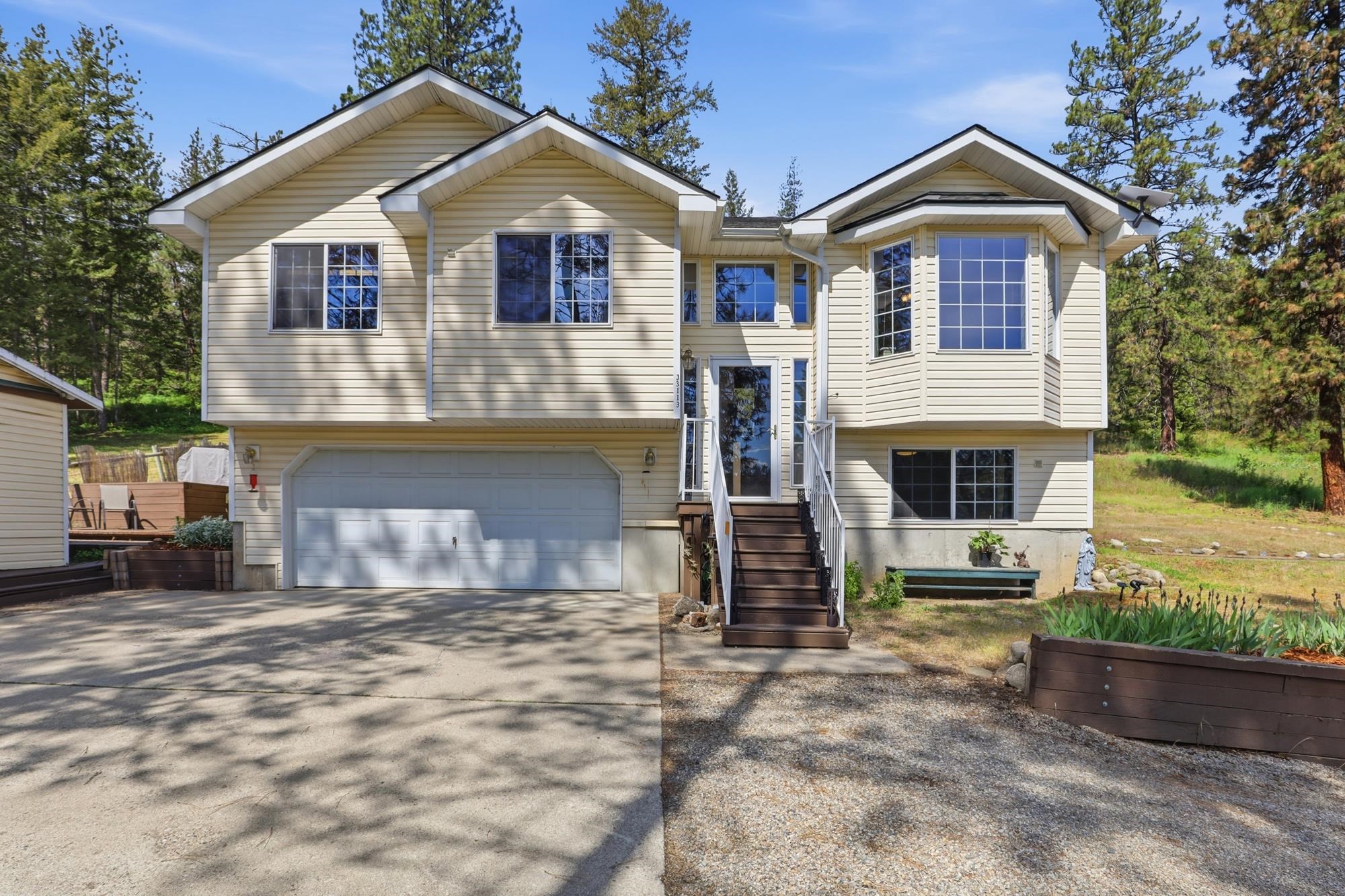 33113 North Milan Road Chattaroy, WA 99003 - Photo 1 of 39