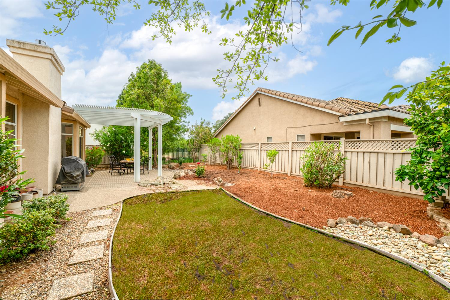 4081 Rose Creek Road Roseville, CA 95747 - Photo 44 of 52 a view of a house with a swimming pool