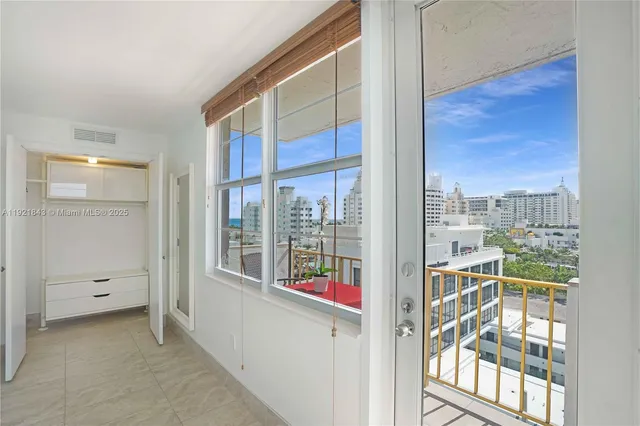 a view of a balcony with city view