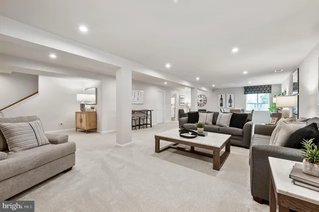 a living room with furniture and a couch