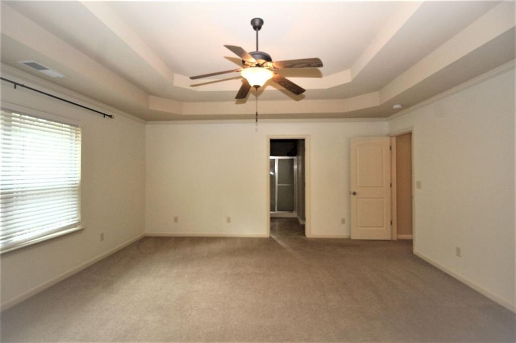 316 Alcovy Way Woodstock, GA 30188 - Photo 19 of 28 a view of an empty room with a window