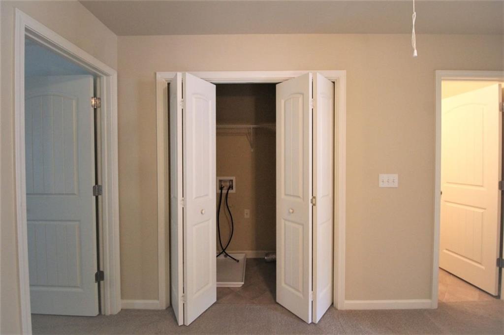 316 Alcovy Way Woodstock, GA 30188 - Photo 20 of 28 a view of closet area