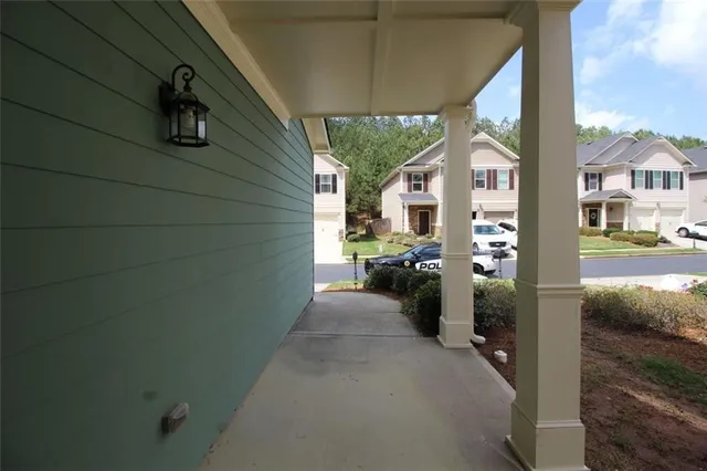 a view of a hallway with staircase