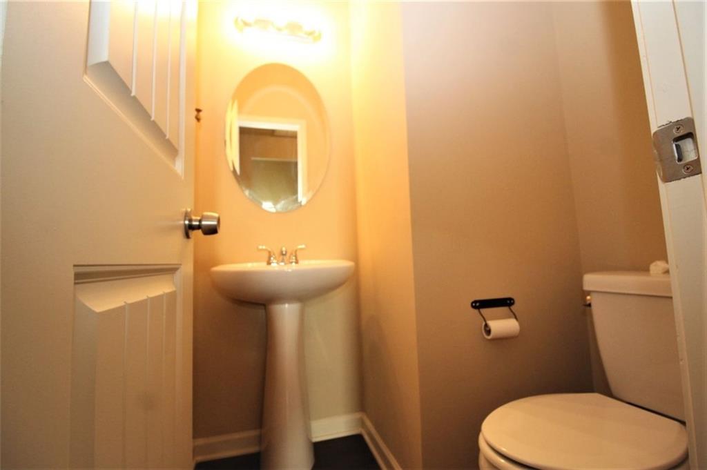 316 Alcovy Way Woodstock, GA 30188 - Photo 6 of 28 a bathroom with a sink and a toilet