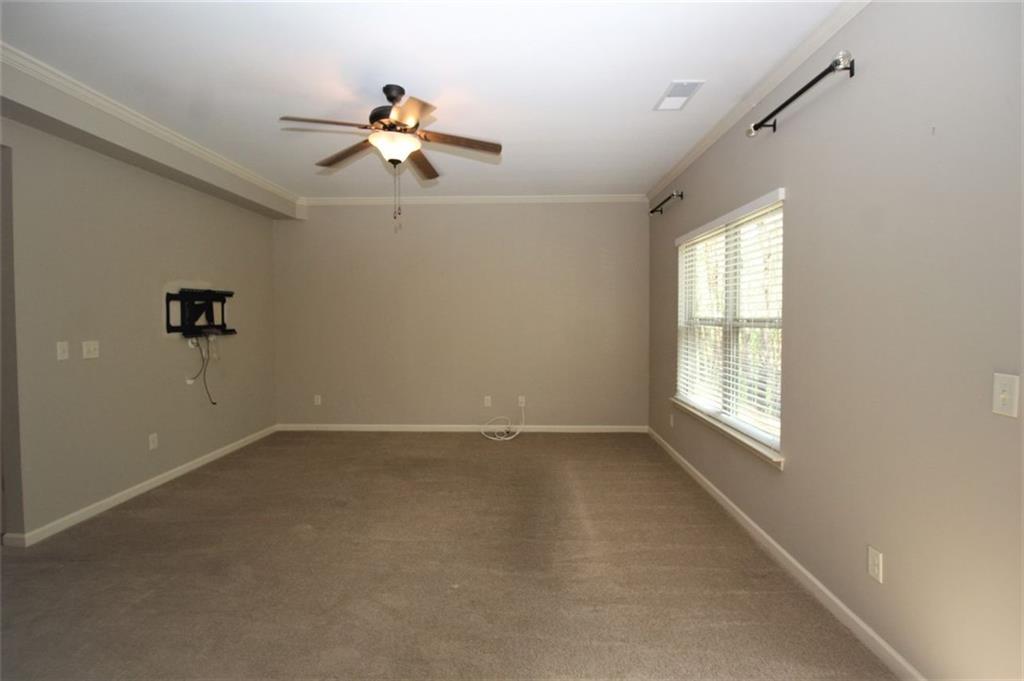 316 Alcovy Way Woodstock, GA 30188 - Photo 10 of 28 a view of an empty room with a window