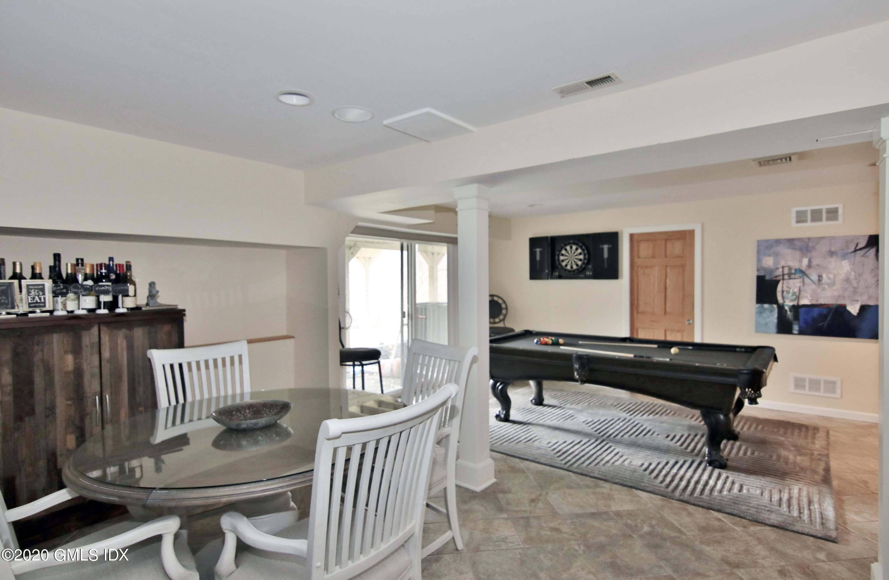 102 Gun Club Road Stamford, CT 06903 - Photo 34 of 41 a living room with furniture and wooden floor