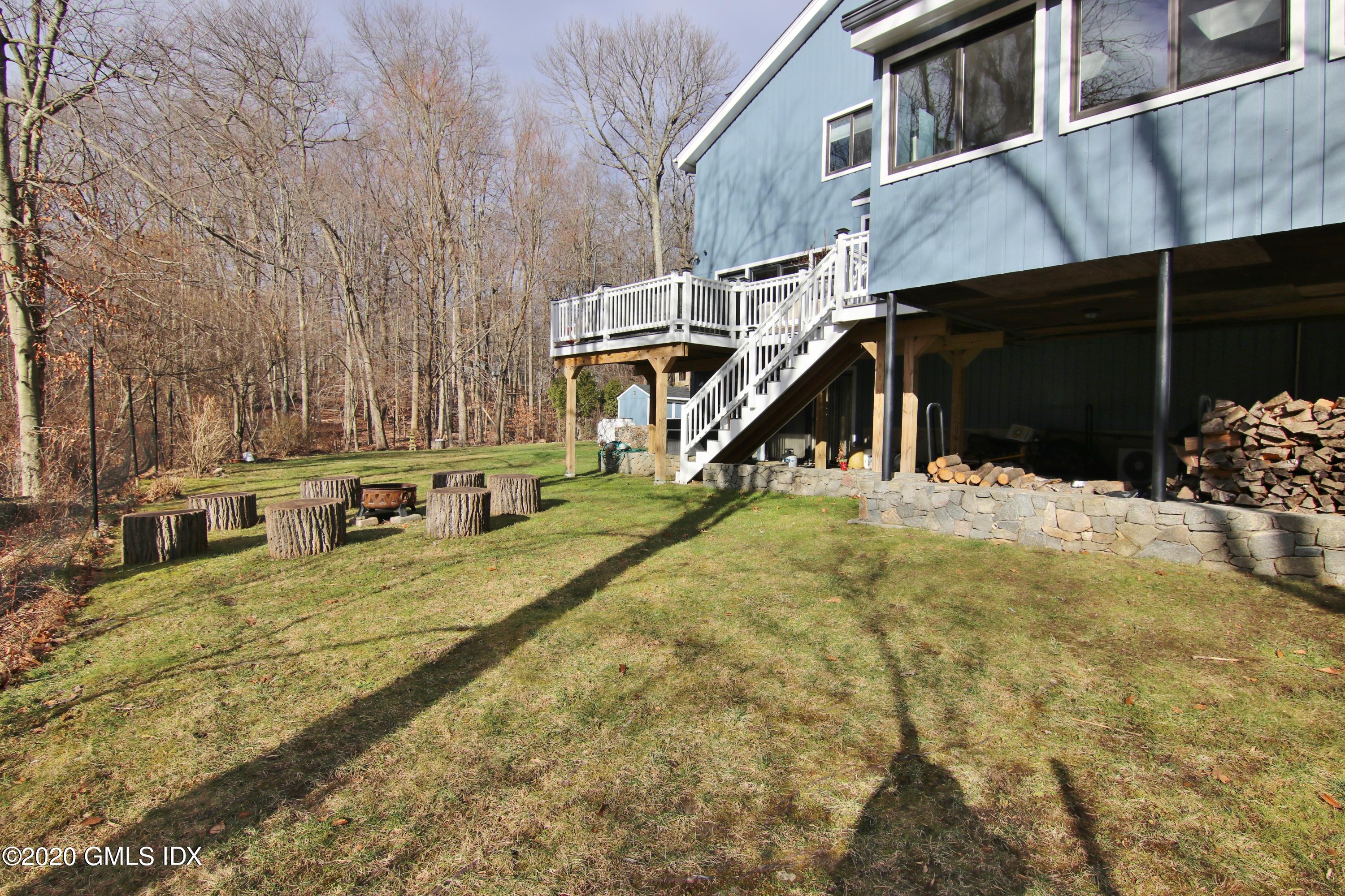 102 Gun Club Road Stamford, CT 06903 - Photo 39 of 41 a view of a house with basketball court