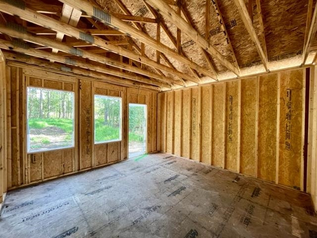 71 Deep Blue Trail Middlesex, NC 27557 - Photo 4 of 9 a view of an empty room with a window