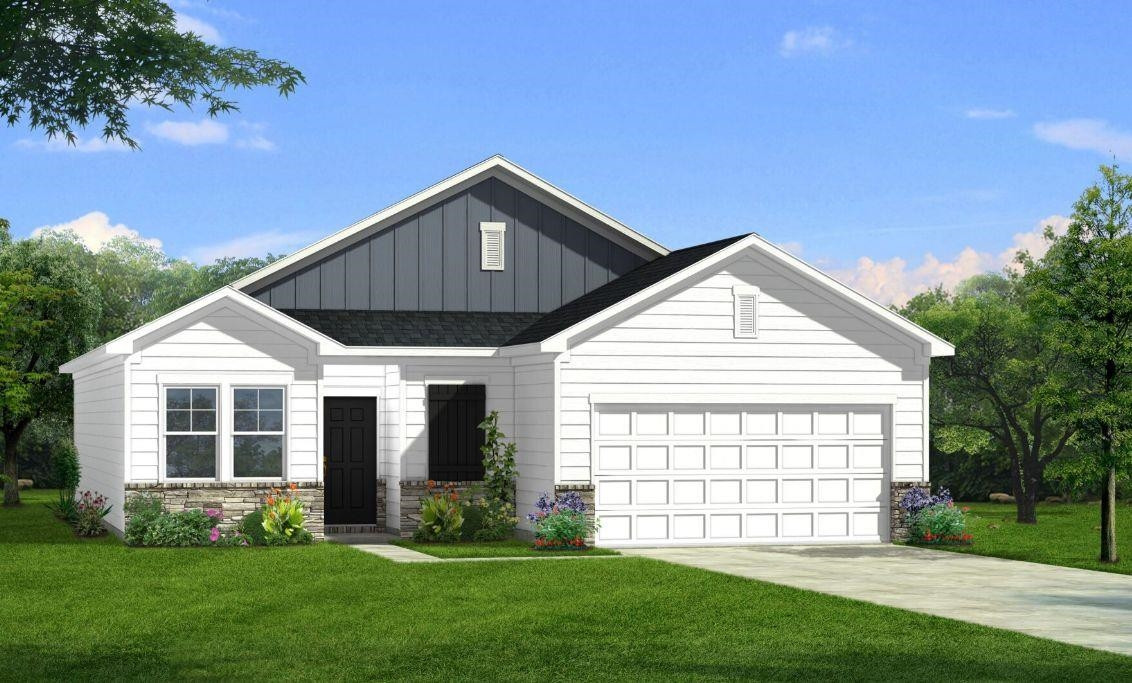 71 Deep Blue Trail Middlesex, NC 27557 - Photo 7 of 9 a front view of a house with a garden and yard