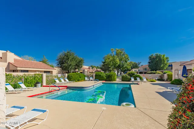 a view of backyard with a garden and plants