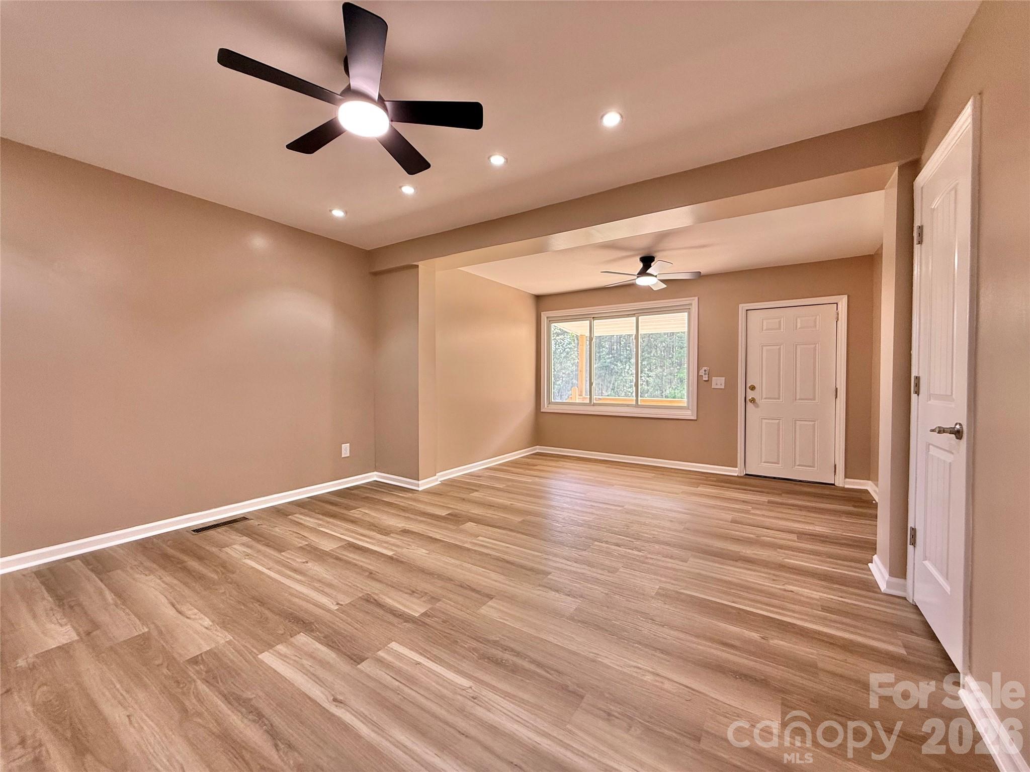878 Stanback Ferry Road Lilesville, NC 28091 - Photo 8 of 19 a view of an empty room with a window