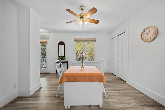 a bathroom with a double vanity sink toilet and shower