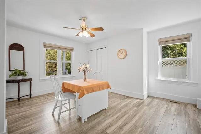 a bathroom with a sink toilet and a mirror