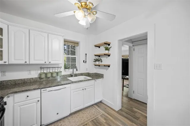 a bed room with a bed and a window