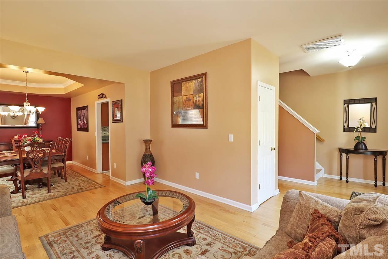 2616 Dality Drive Raleigh, NC 27604 - Photo 6 of 25 a living room with furniture and a dining table