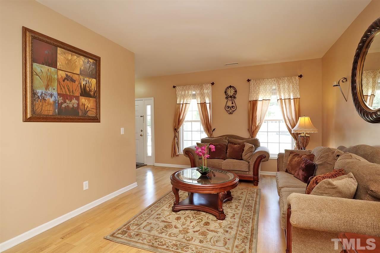 2616 Dality Drive Raleigh, NC 27604 - Photo 7 of 25 a living room with furniture and a window