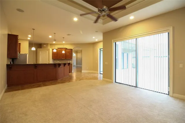 a view of a hallway with a large window