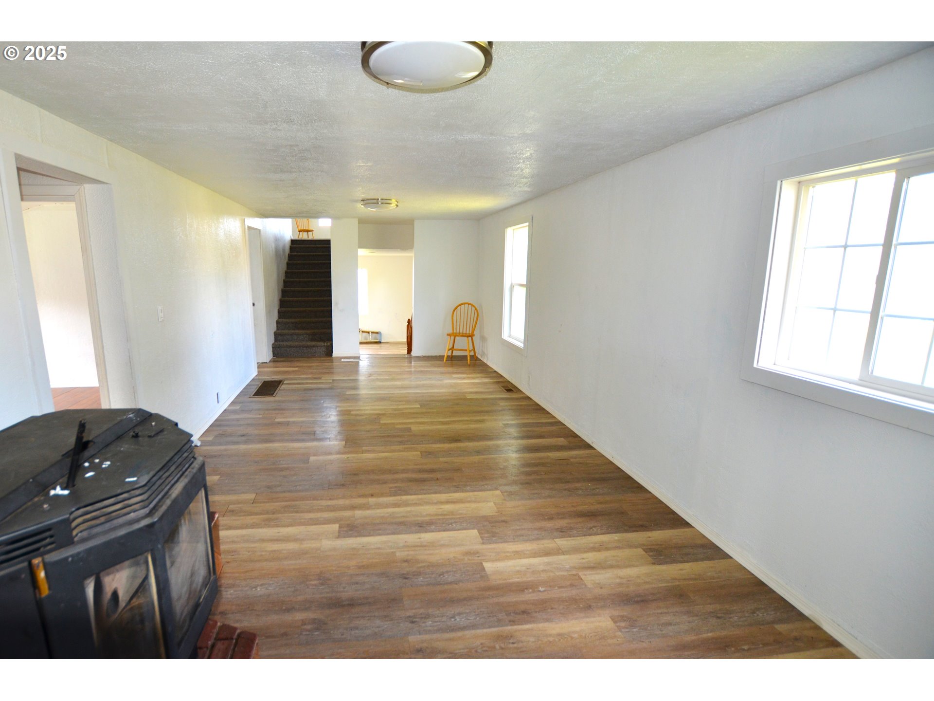 520 Northeast 4th Street Pilot Rock, OR 97868 - Photo 9 of 28 a view of a livingroom with wooden floor