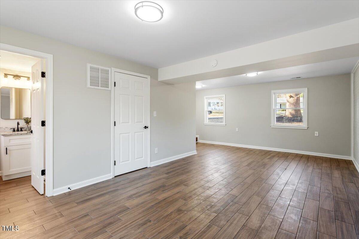 1004 Helms Place Raleigh, NC 27610 - Photo 28 of 37 Lower Level Den