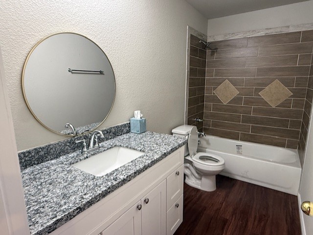 2410 Westcliff Road Killeen, TX 76543 - Photo 15 of 18 A well-appointed bathroom features a contemporary vanity and a tub with stylish tile surround.