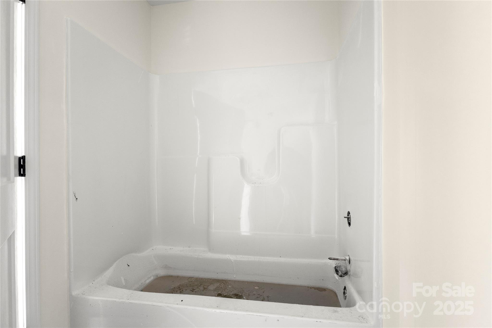 545 Washington Street Rock Hill, SC 29730 - Photo 22 of 25 a bathroom with a bathtub
