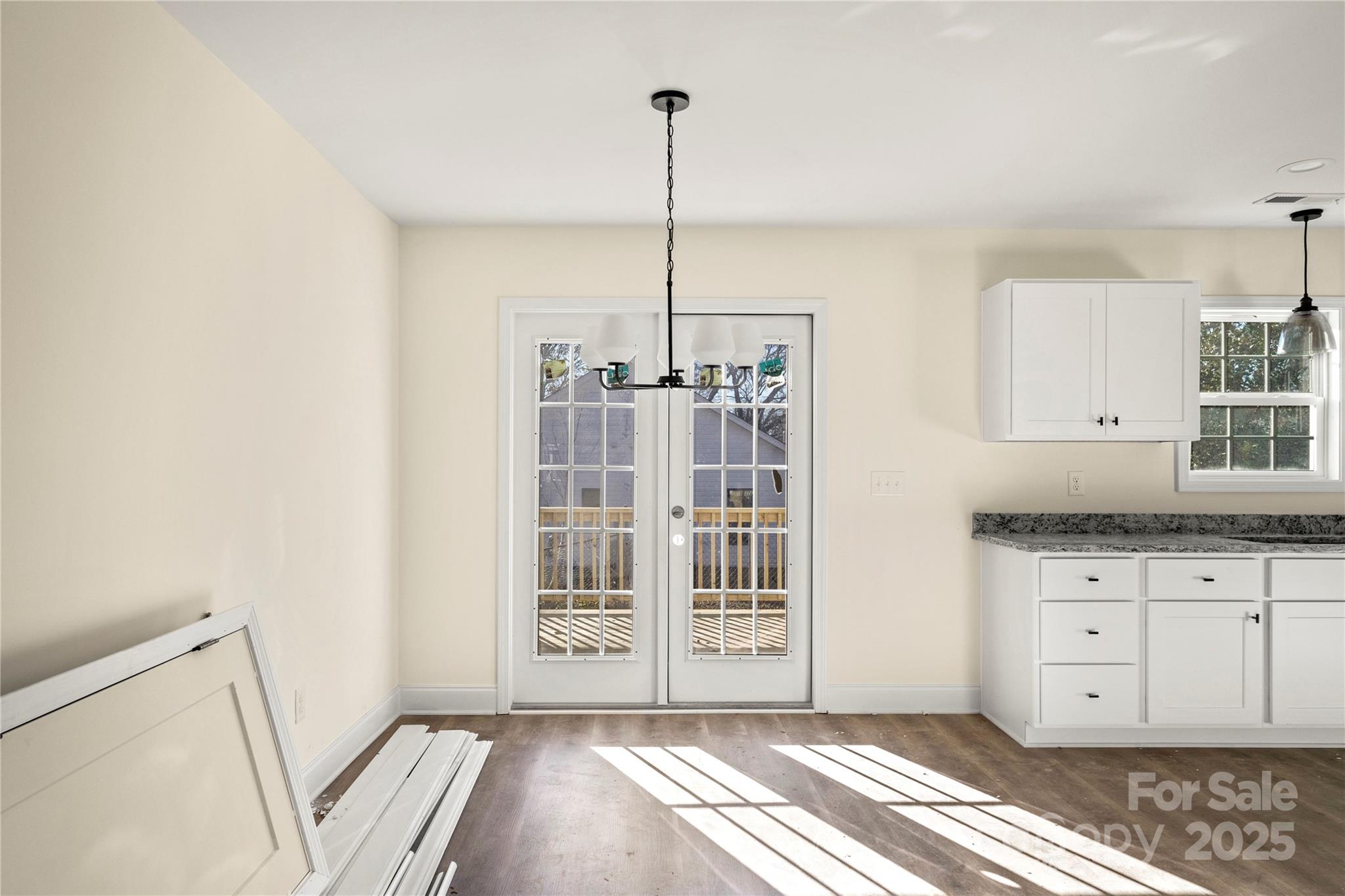 545 Washington Street Rock Hill, SC 29730 - Photo 6 of 25 a spacious bedroom with a bed and a window