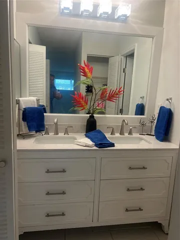 a view of swimming pool with a yard