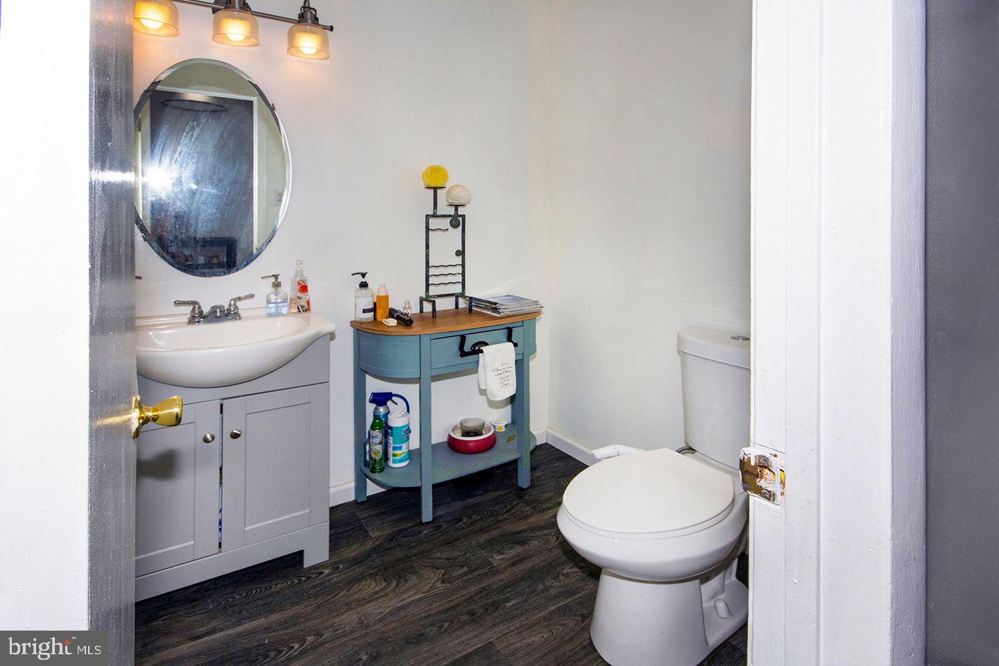 303 Via Cascata Drive Clementon, NJ 08021 - Photo 4 of 32 Powder Room @ Entrance: New Vanity, Laminate Floor