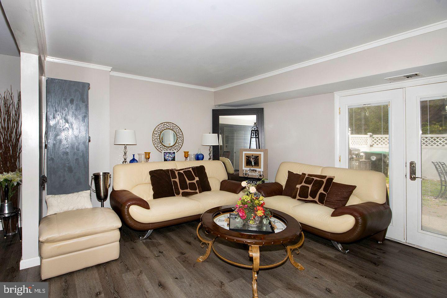 303 Via Cascata Drive Clementon, NJ 08021 - Photo 10 of 32 Living Room: Upgraded rear Egress