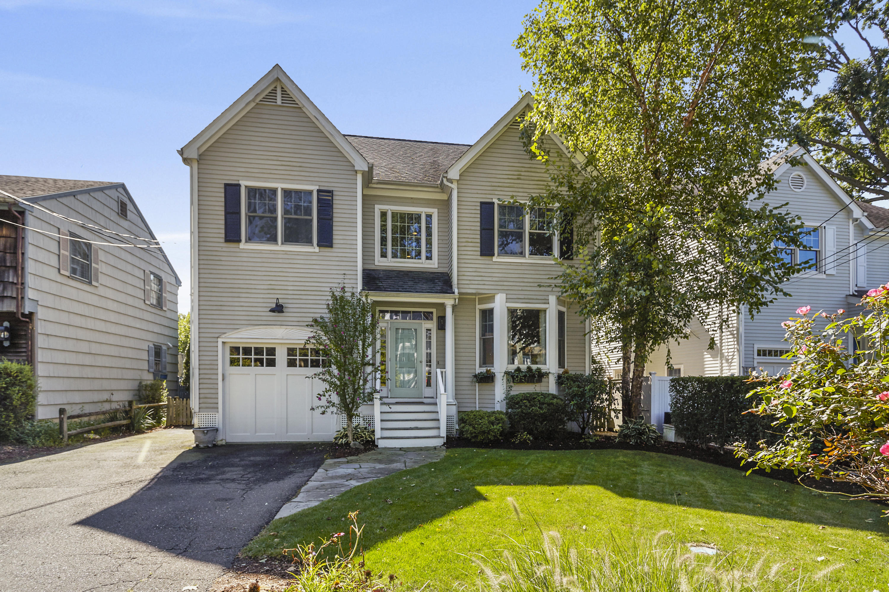 14 Richmond Road Rowayton, CT 06853 - Photo 1 of 28 a view of a house with a yard and plants
