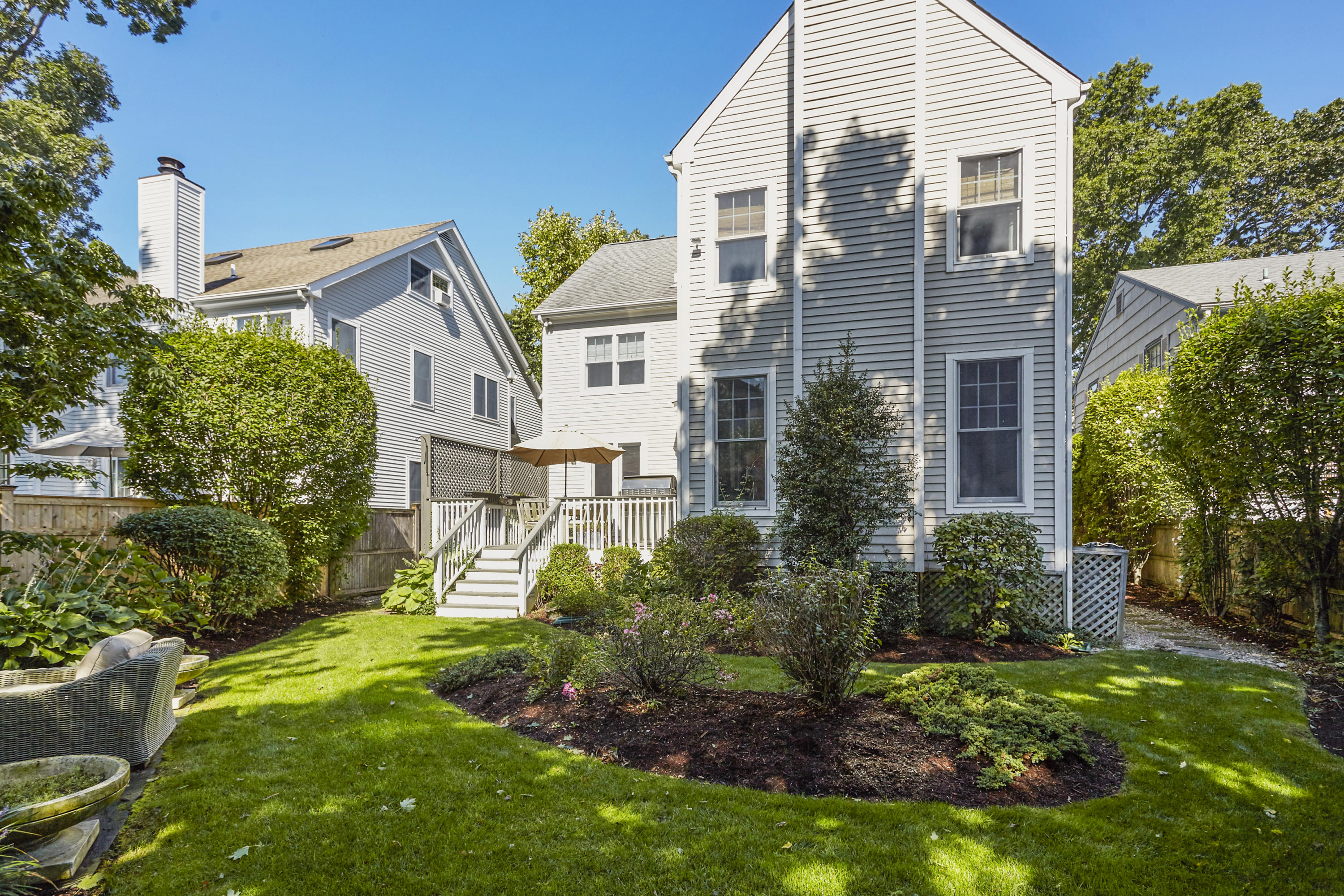 14 Richmond Road Rowayton, CT 06853 - Photo 23 of 28 a aerial view of a house with a yard and potted plants