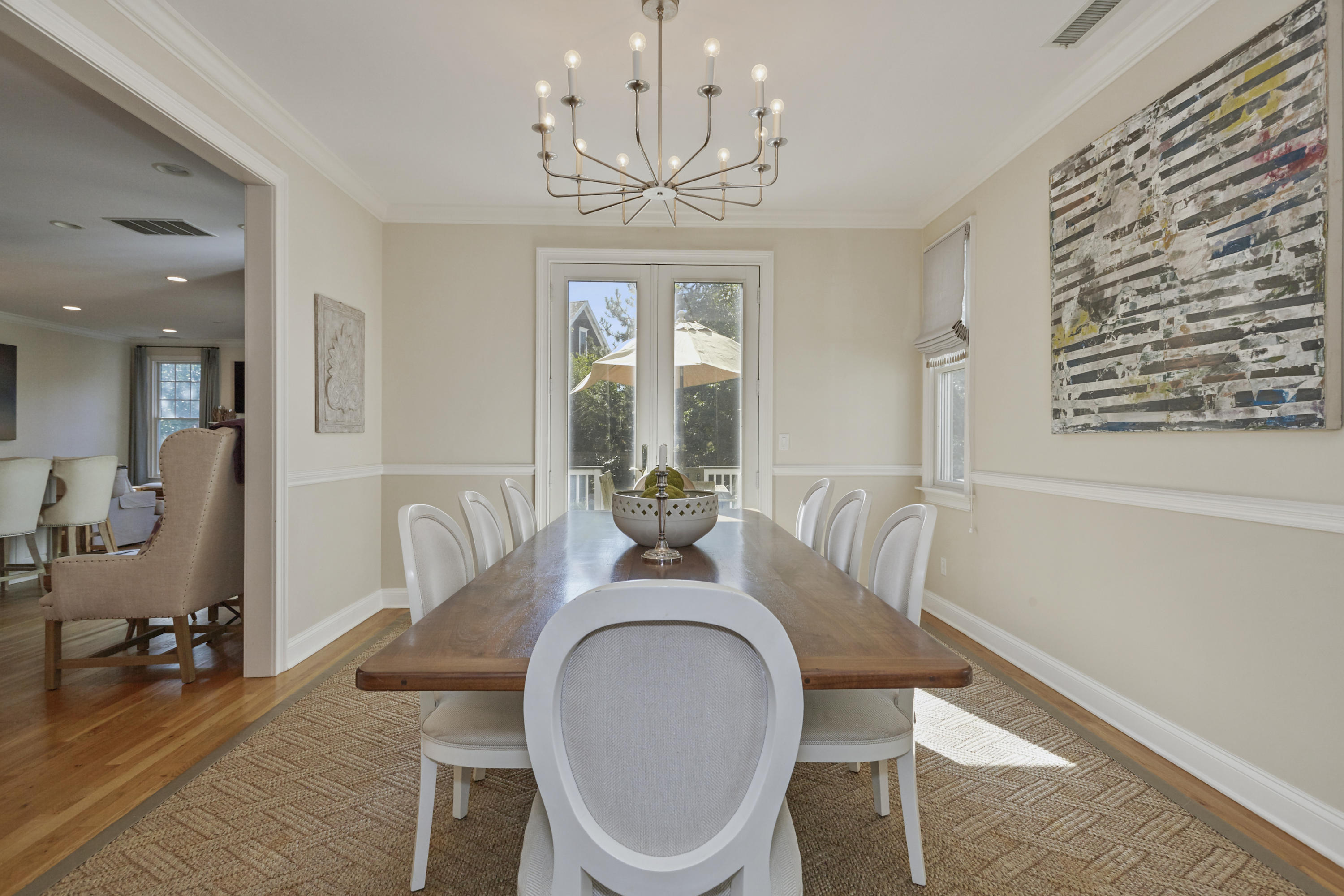 14 Richmond Road Rowayton, CT 06853 - Photo 5 of 28 a view of a dining room with furniture wooden floor and chandelier