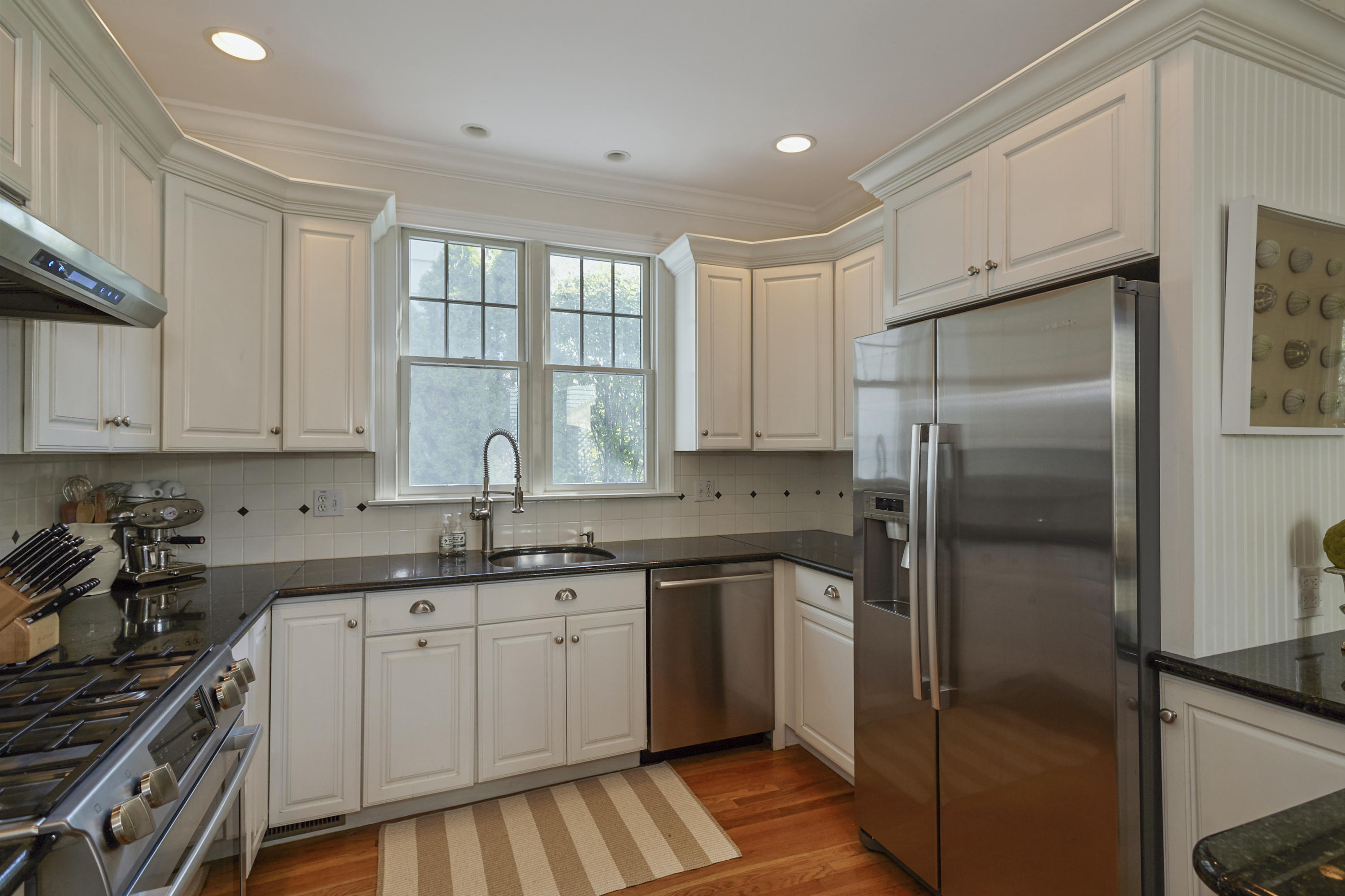 14 Richmond Road Rowayton, CT 06853 - Photo 8 of 28 a kitchen with a sink stove and refrigerator