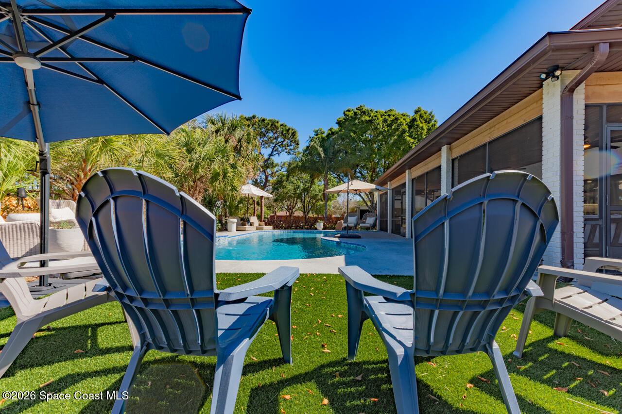 2780 Pomello Road Malabar, FL 32950 - Photo 21 of 79 Pool turf seating