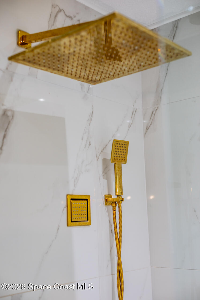 2780 Pomello Road Malabar, FL 32950 - Photo 43 of 79 Primary bath shower