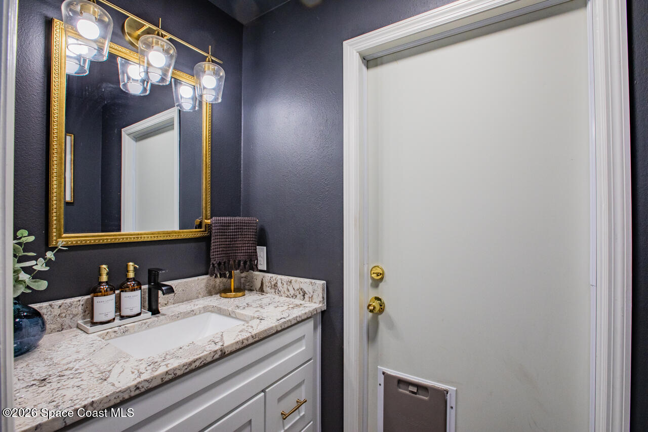 2780 Pomello Road Malabar, FL 32950 - Photo 59 of 79 Downstairs half bath